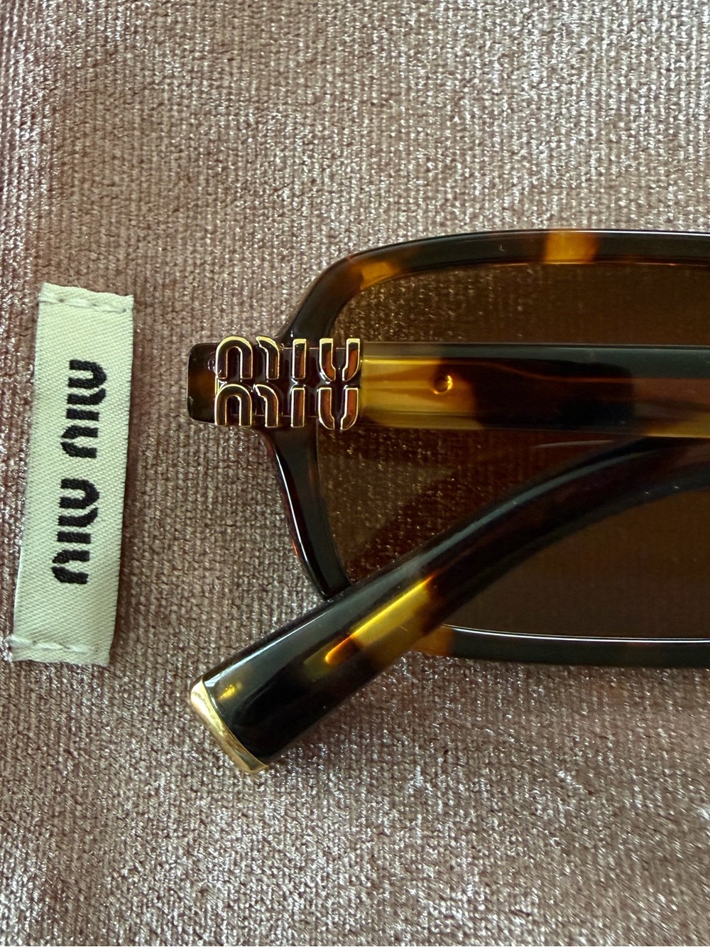 Miu Miu Tortoiseshell Sunglasses with Gold Logo Accent